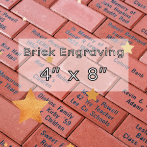 Image of commemorative brick wall - Text says 4 inch by 8 inch brick engraving.