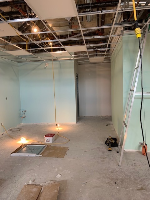 Image shows the front room under construction
